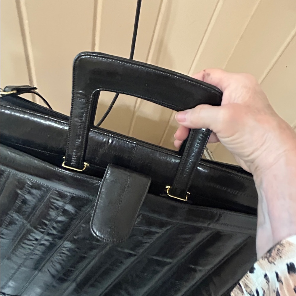 Vintage Black Eel soft Leather Computer bag with side pockets with Gold Trim